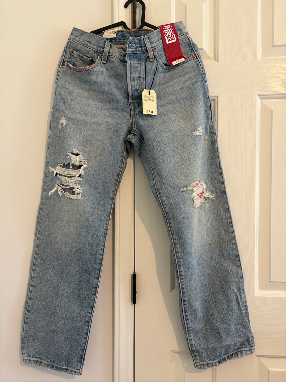 Levi's Light Wash Distressed Boyfriend Jeans with Paint Accents